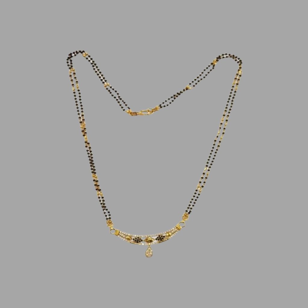 Ethnic black beads gold chain jewelnidhi